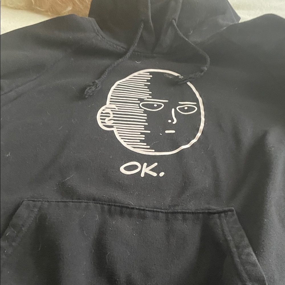Black Graphic Hoodie with Minimal Face and "OK." Print